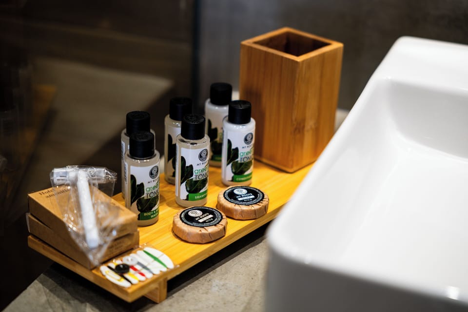 Suite with City Views | Bathroom amenities | Shower, hair dryer, slippers, towels