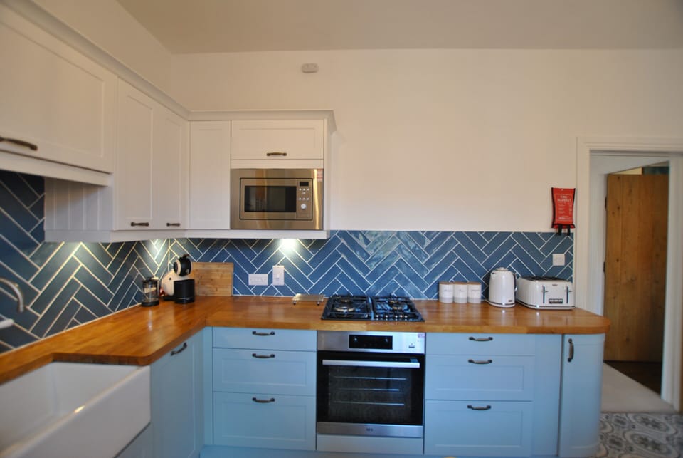 The kitchen has all expected modern appliances