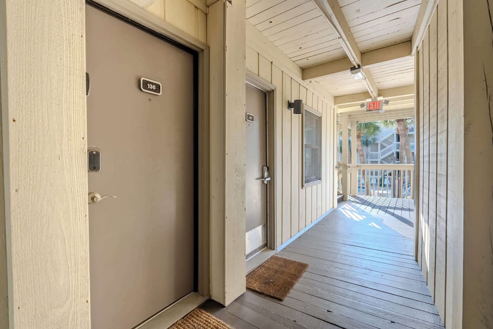 The front door of the unit, located just steps away from the resort pool!