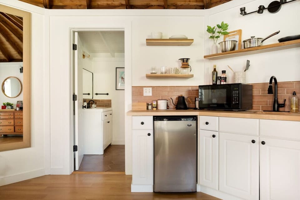 A clean, functional kitchenette with intentional details.