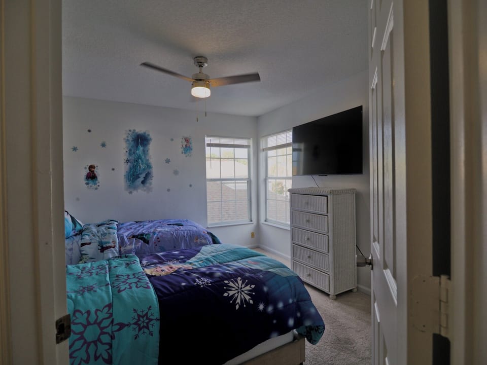 Frozen room with two twin beds.