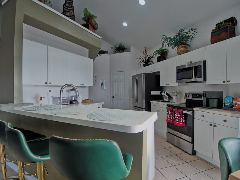 Kitchen and bar seating.