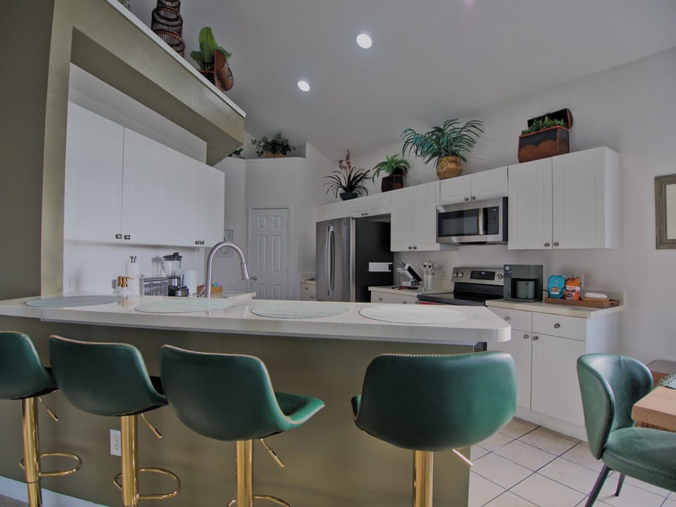 Kitchen and bar seating.