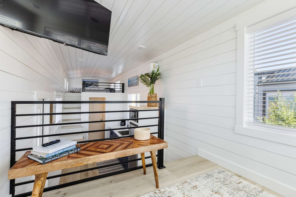 A comfortable upper-level seating area offers the perfect spot to watch TV, read, or plan your next adventure near Zion National Park.