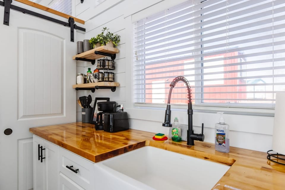 Full kitchen featuring modern fixtures, generous counter space, and natural light. Ideal for simple meals, snacks, and relaxing evenings in.