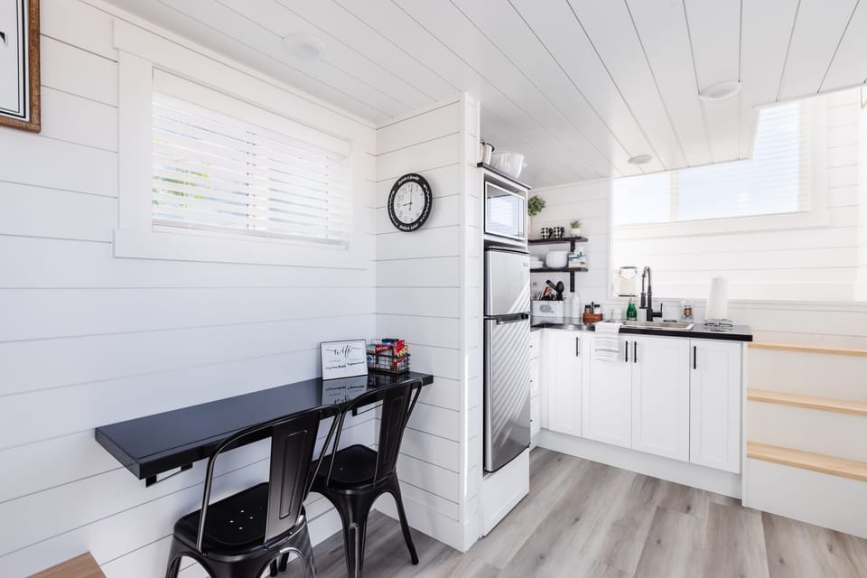 Kitchen and dining counter with bar seating, creating a convenient spot for meals, coffee, or planning the day's Zion adventures.