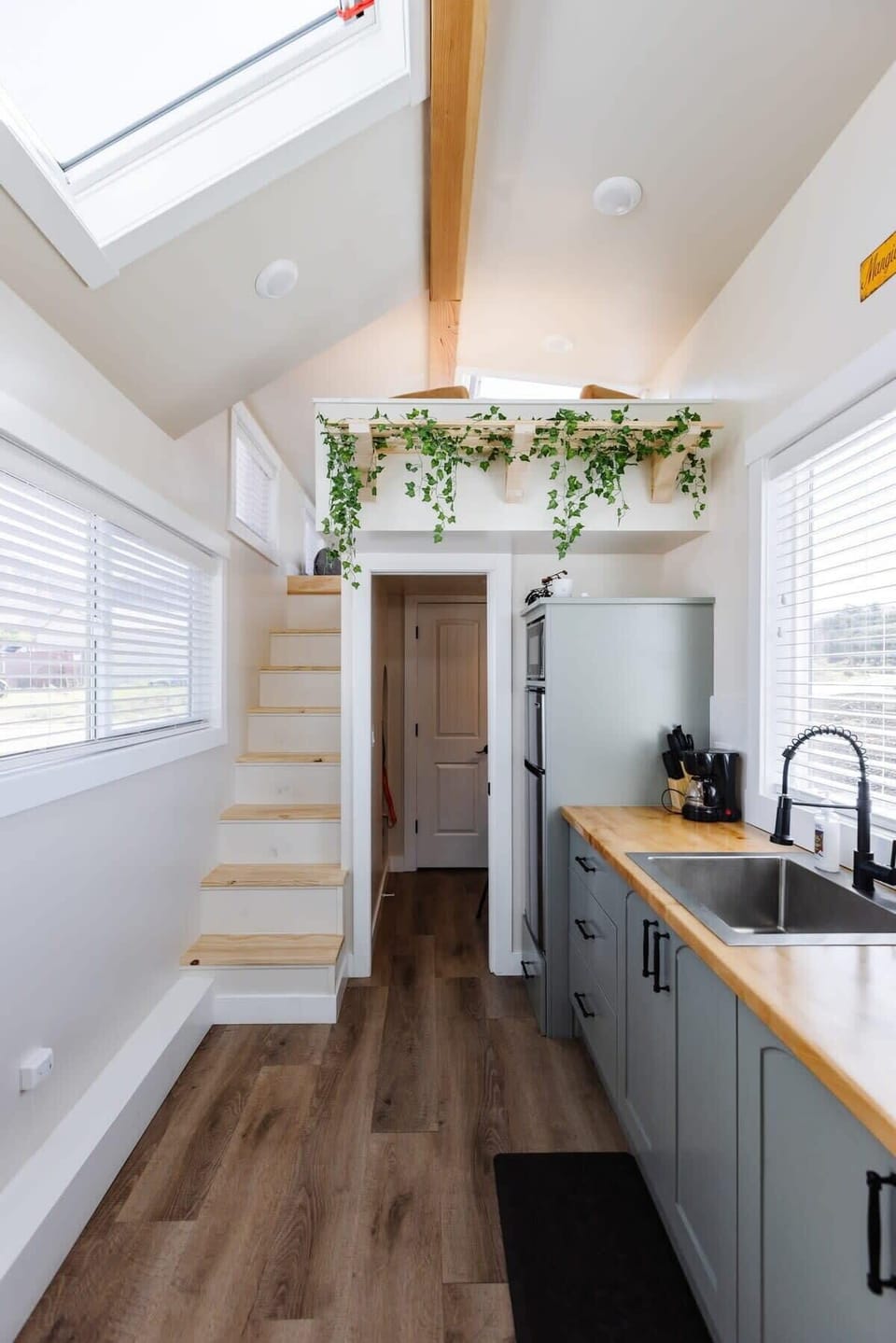 The kitchen is fully equipped with a refrigerator, freezer, microwave, cook-top and sink with hot/cold water. Enjoy coffee from the coffee maker, and find ample counter space, cookware, and storage for all your meal prep needs.