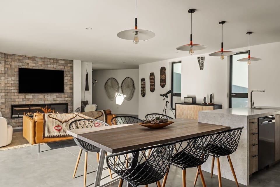 Seamless kitchen to dining to living room.
