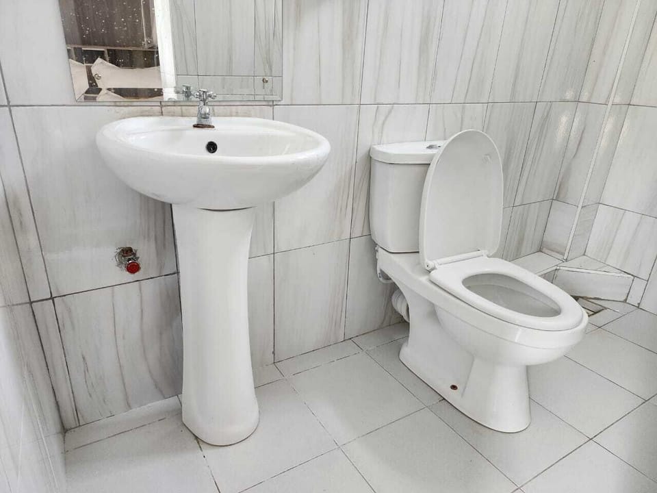 Deluxe Double Room, Garden View | Bathroom | Shower, slippers, towels, soap