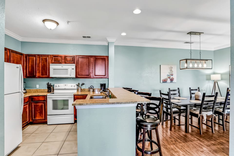 A conveniently equipped kitchen with everything you need to cook, dine, and feel right at home.