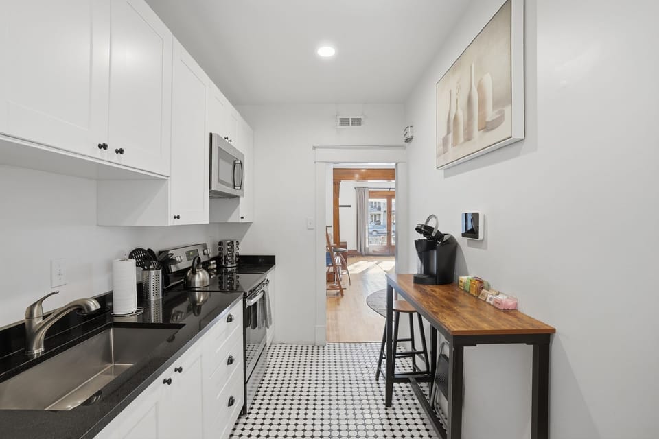 Galley kitchen with a view into the living space.