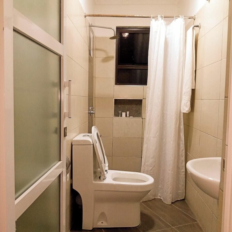 Deluxe Single Room | Bathroom | Shower, slippers, towels, soap