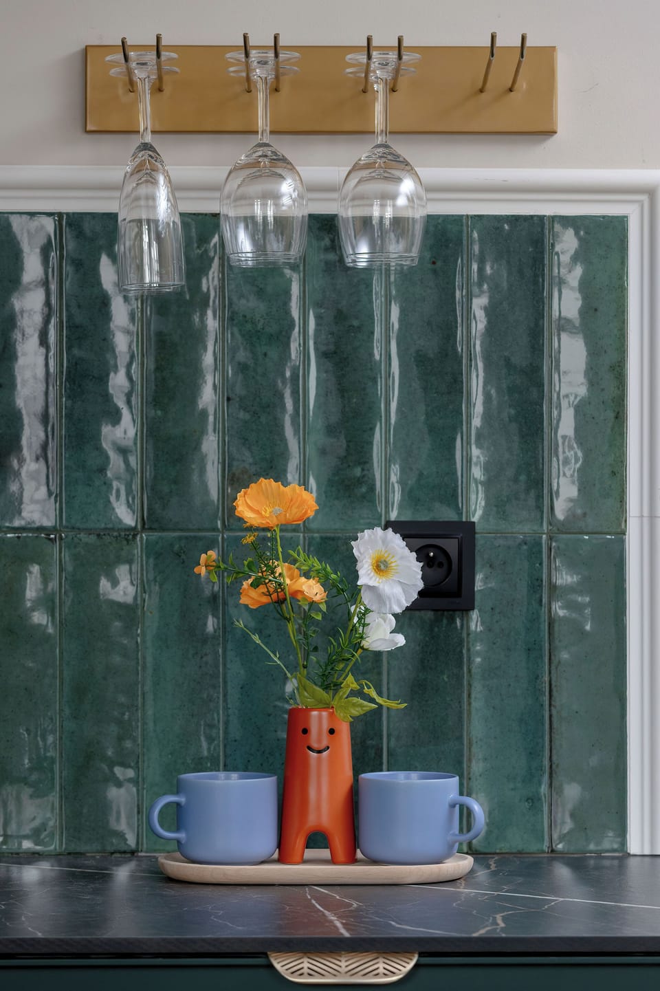 Decorative detail with coffee cups and minimalist styling.