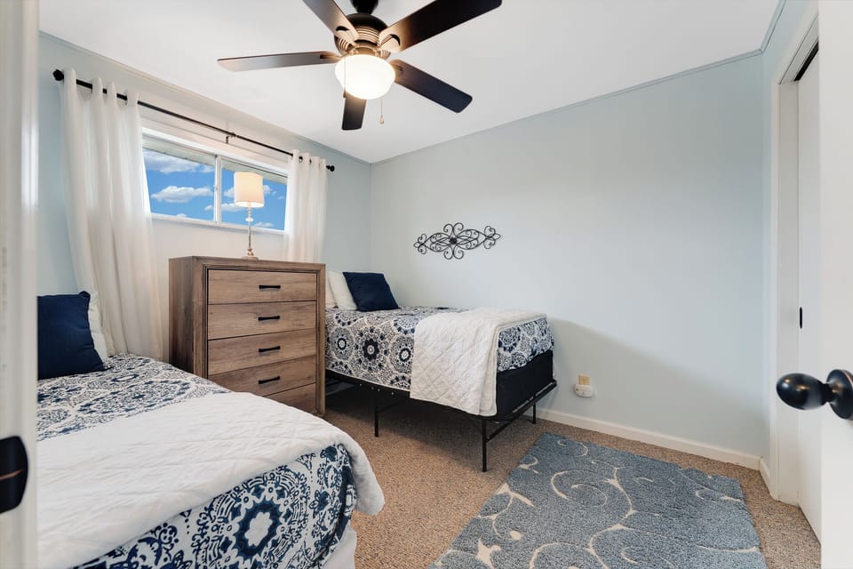 Cozy twin bedroom perfect for families or friends.