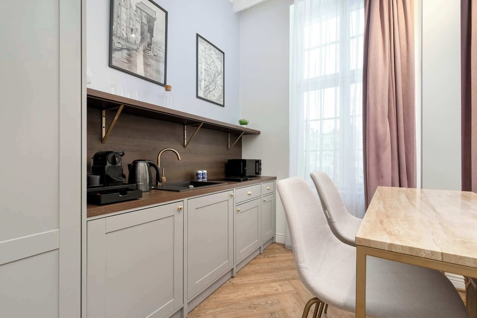 Kitchenette and dining nook in studio.