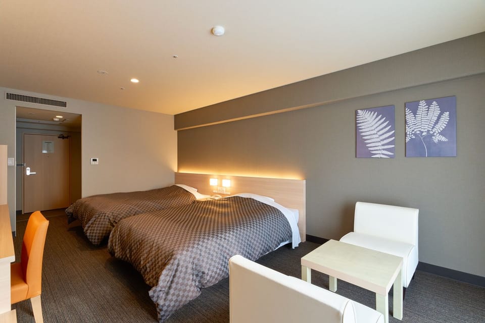 Twin Room, 2 Double Beds | In-room safe, desk, laptop workspace, WiFi (free)