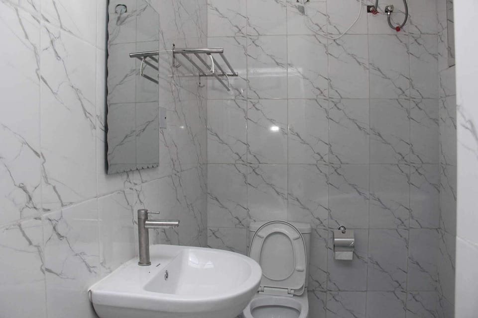 Family Room, Balcony, City View | Bathroom | Free toiletries, hair dryer, towels, soap