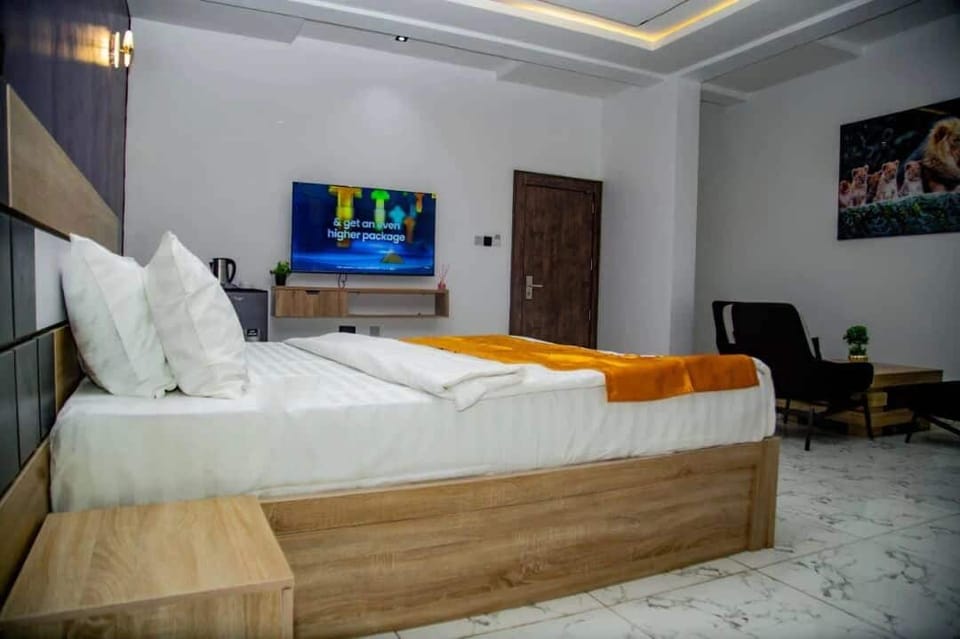 Family Room, Balcony, City View | Desk, laptop workspace, blackout drapes, soundproofing