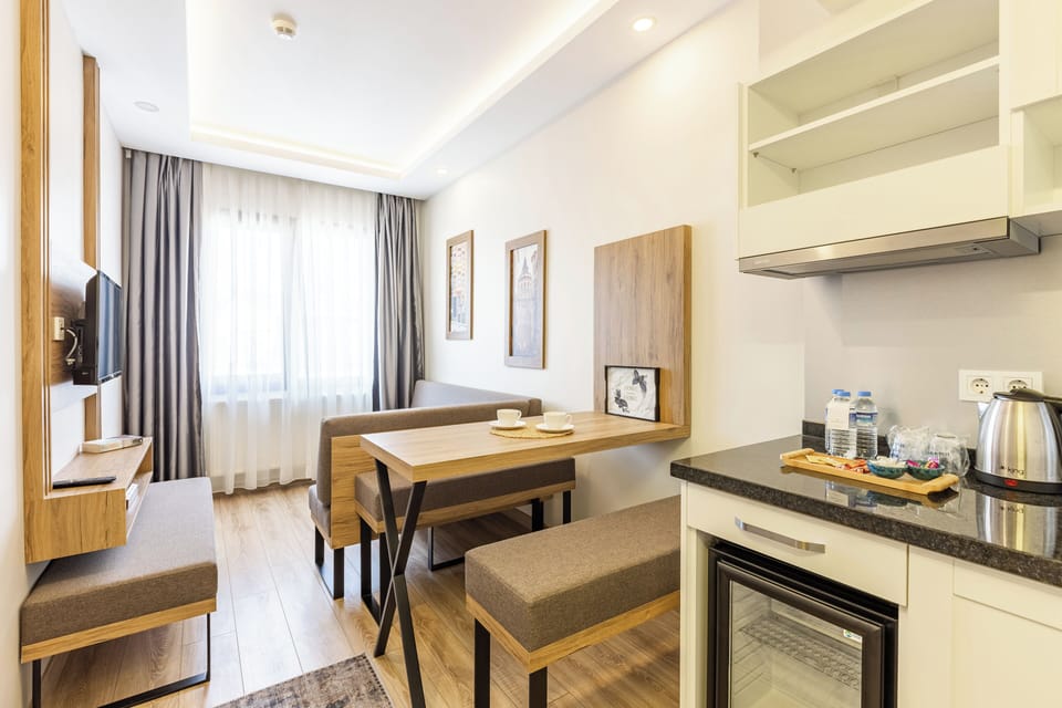 Junior Suite | Living area | 32-inch LCD TV with satellite channels, Netflix, streaming services