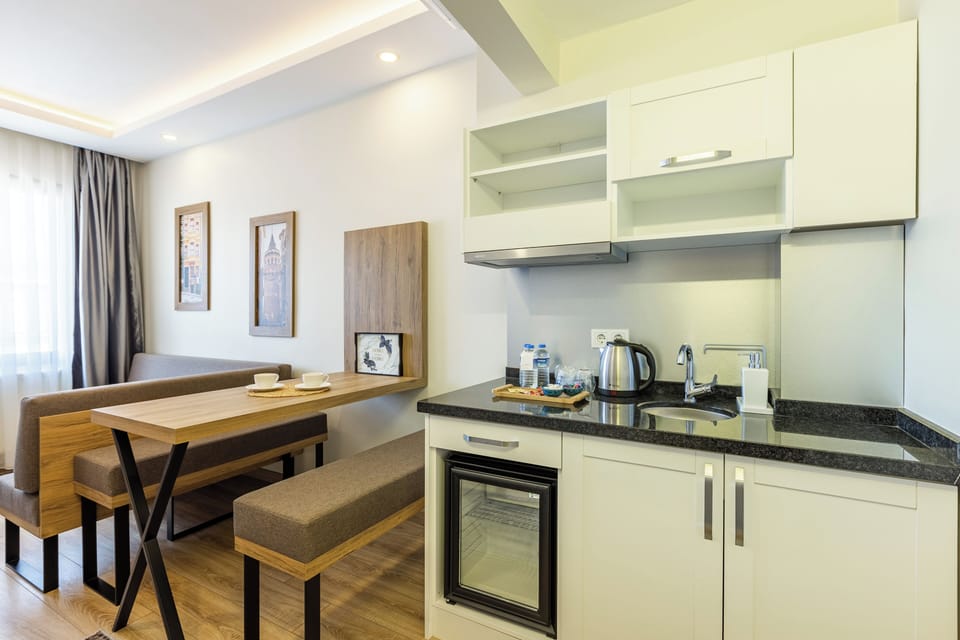 Junior Suite | Living area | 32-inch LCD TV with satellite channels, Netflix, streaming services