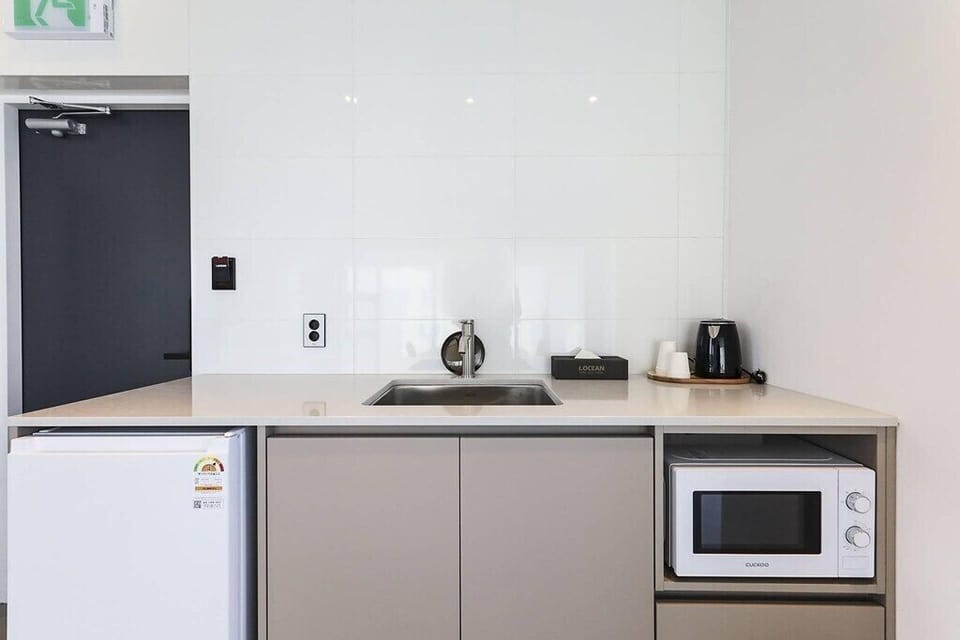 Shared fridge, electric kettle, dining tables