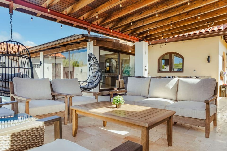 Relax under the shade with soft seating and a laid-back vibe, perfect for slow afternoons.