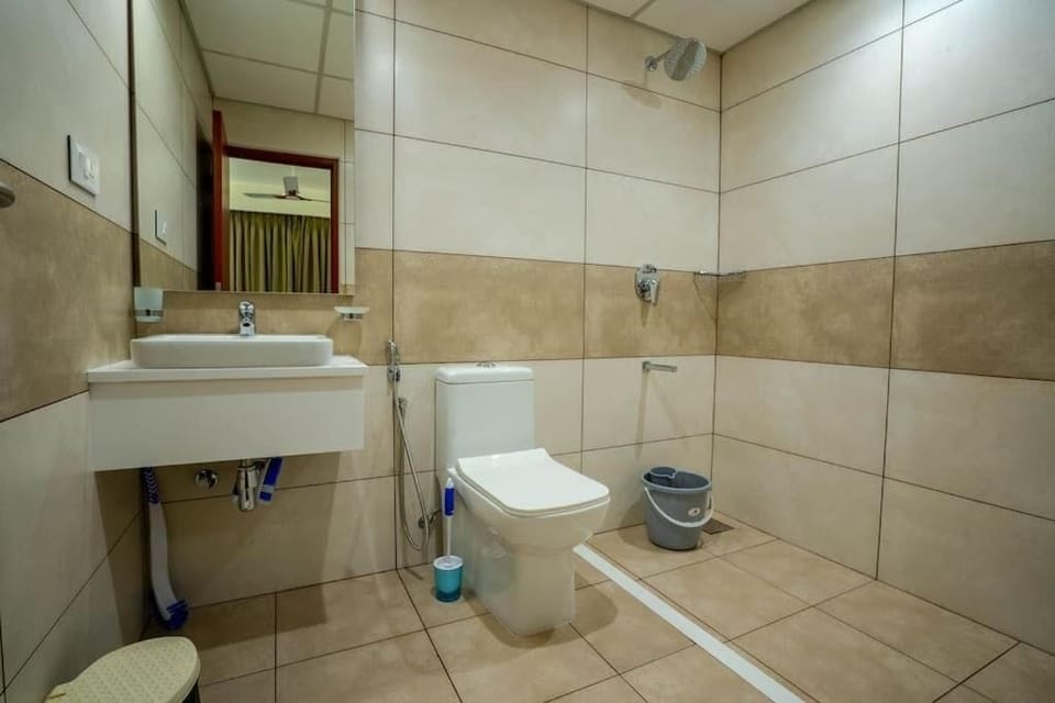 Shower, towels, soap, toilet paper