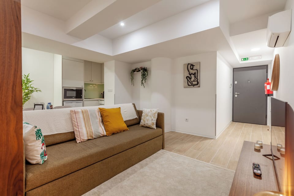 Comfort Studio | Living area | Flat-screen TV