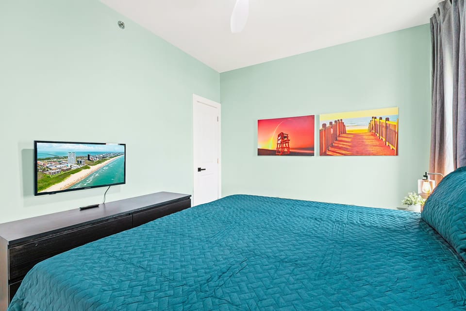 The guest bedroom continues the boho-chic theme with designer accents and plush bedding, ensuring every guest enjoys a luxury hotel-level sleep