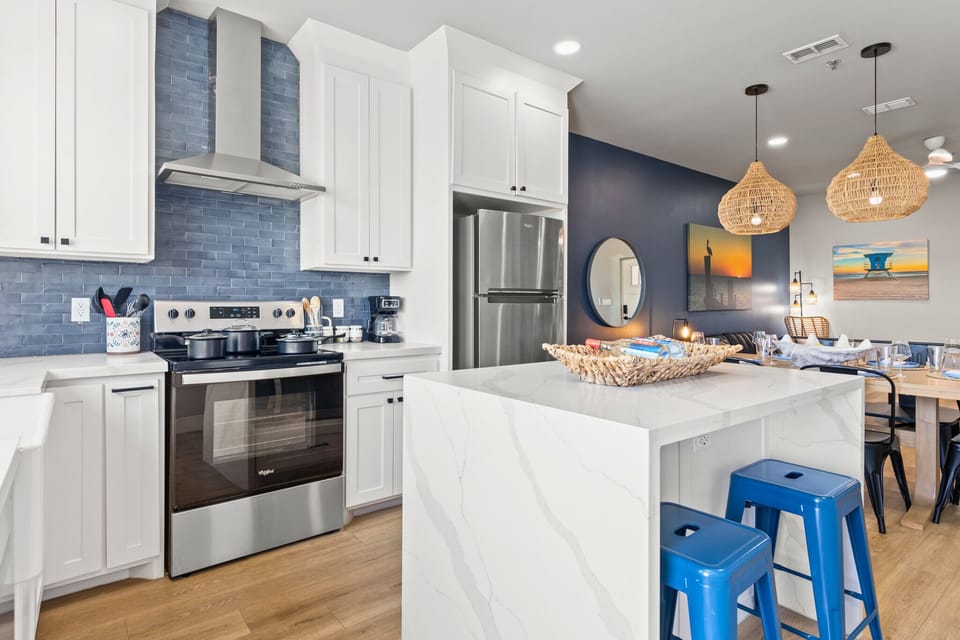 Cook and socialize with ease in this contemporary island kitchen setup.