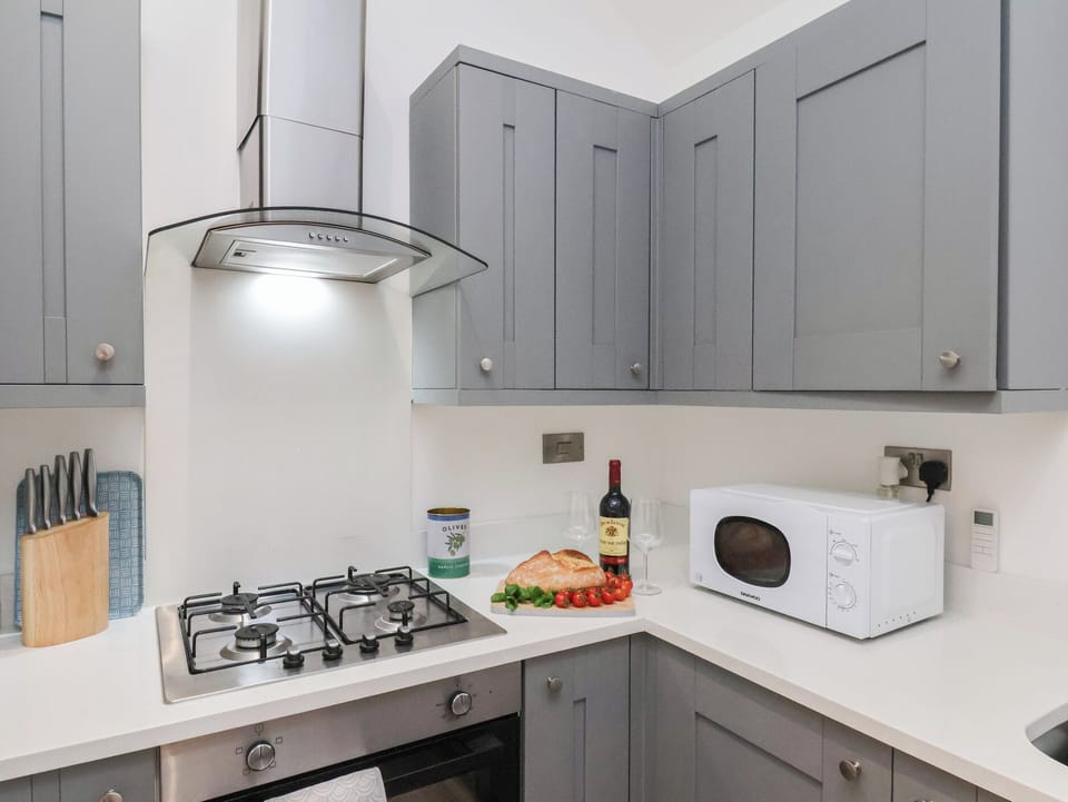 Fridge, microwave, toaster, cookware/dishes/utensils