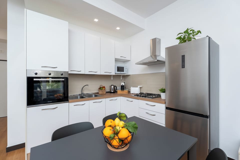 Apartment, 2 Bedrooms, Balcony | Private kitchen | Full-size fridge, microwave, oven, stovetop