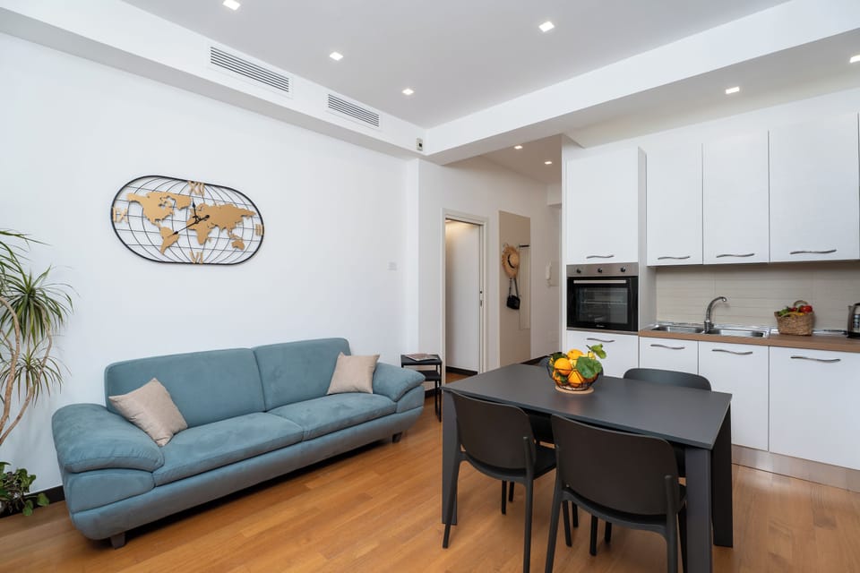 Apartment, 2 Bedrooms, Balcony | Living area | 32-inch flat-screen TV with digital channels