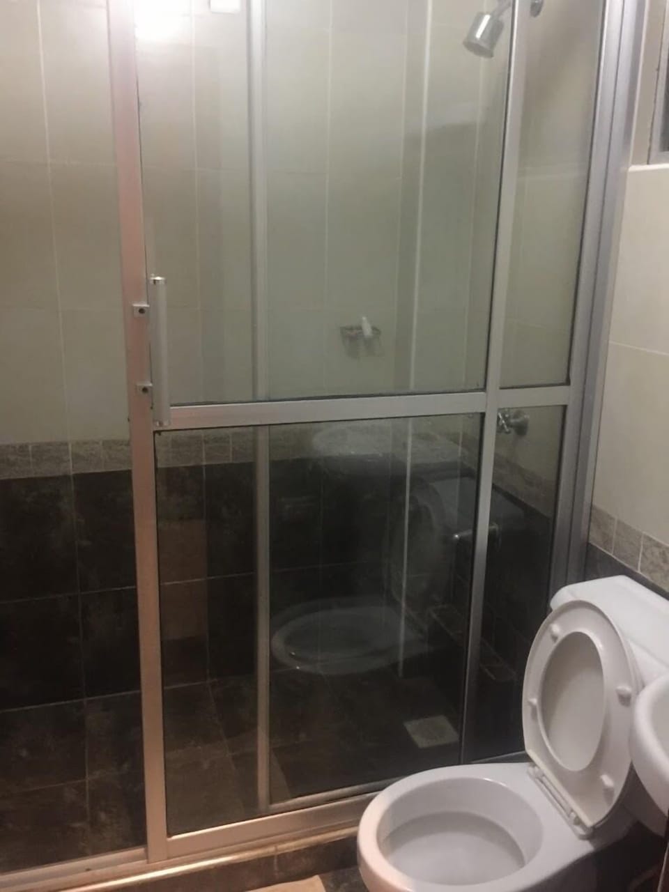 Standard Double Room | Bathroom | Shower, slippers, towels, soap