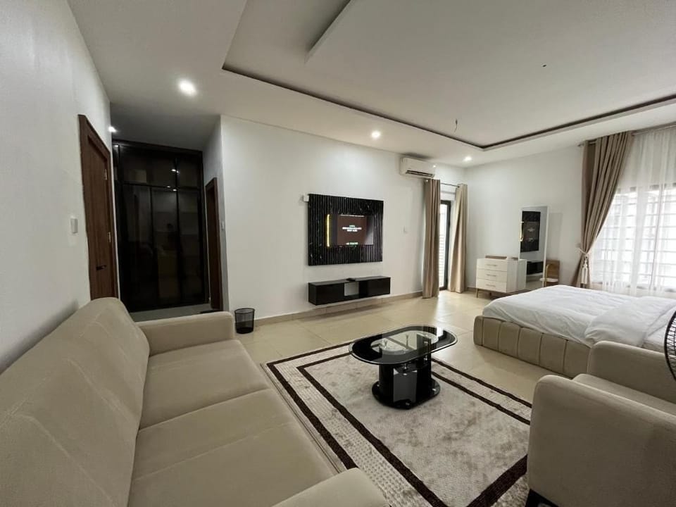 Deluxe Room, Balcony, City View | In-room safe, desk, laptop workspace, blackout drapes