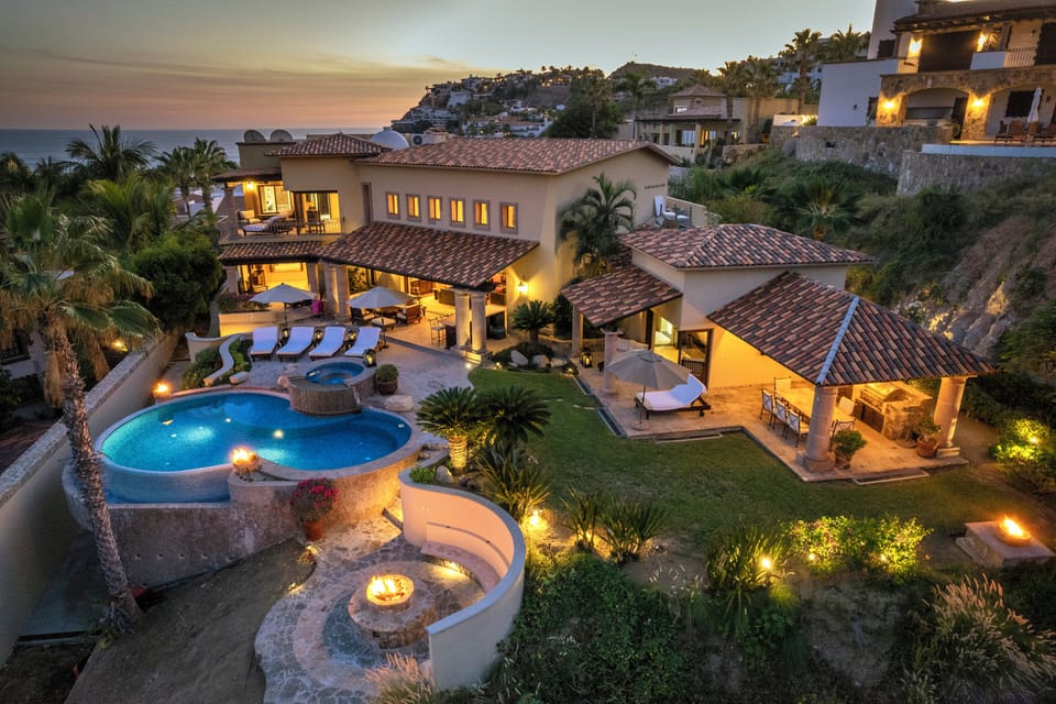 Bird's eye view of villa during sunset