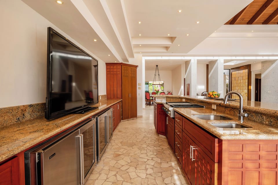 Fully equipped kitchen with TV