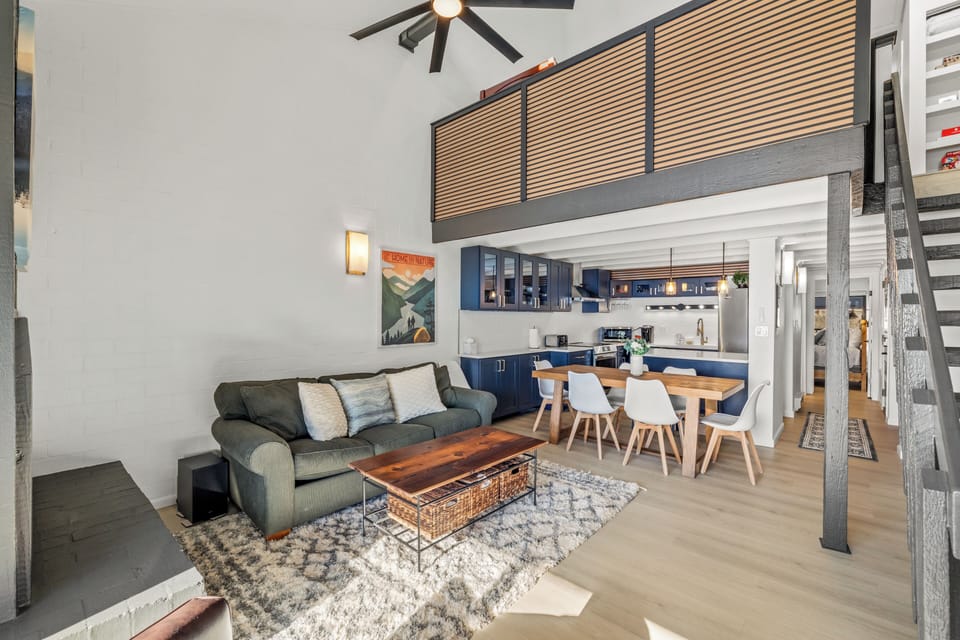 Unwind in your stylish loft with soaring ceilings, modern kitchen, and cozy living space perfectly designed for your mountain getaway.