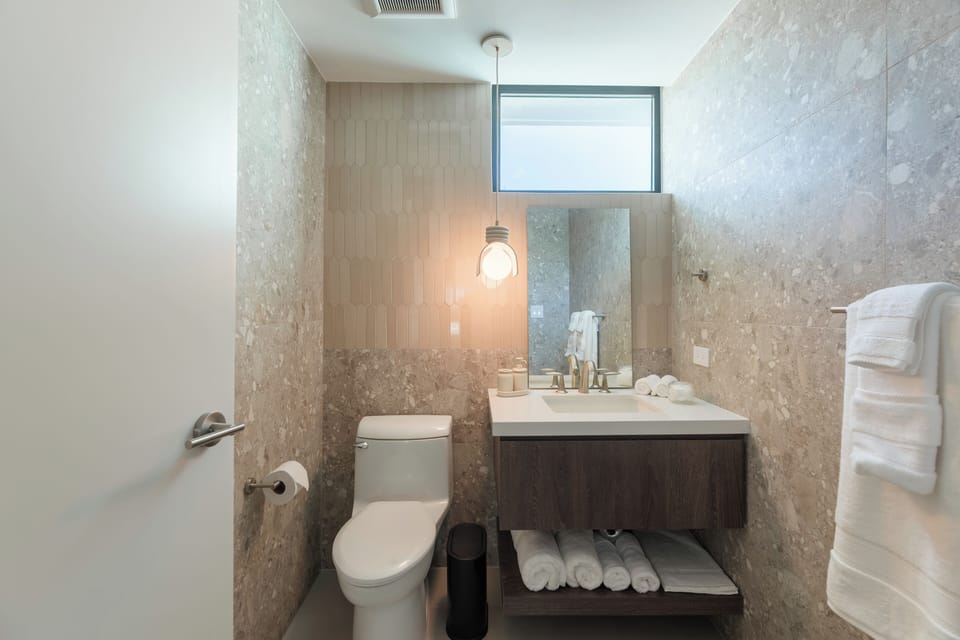 Deluxe Double Room, Kitchenette | Bathroom | Shower, hair dryer, towels, soap