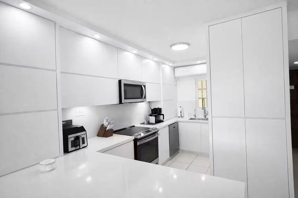 Bright designer kitchen with everything needed for a perfect stay.