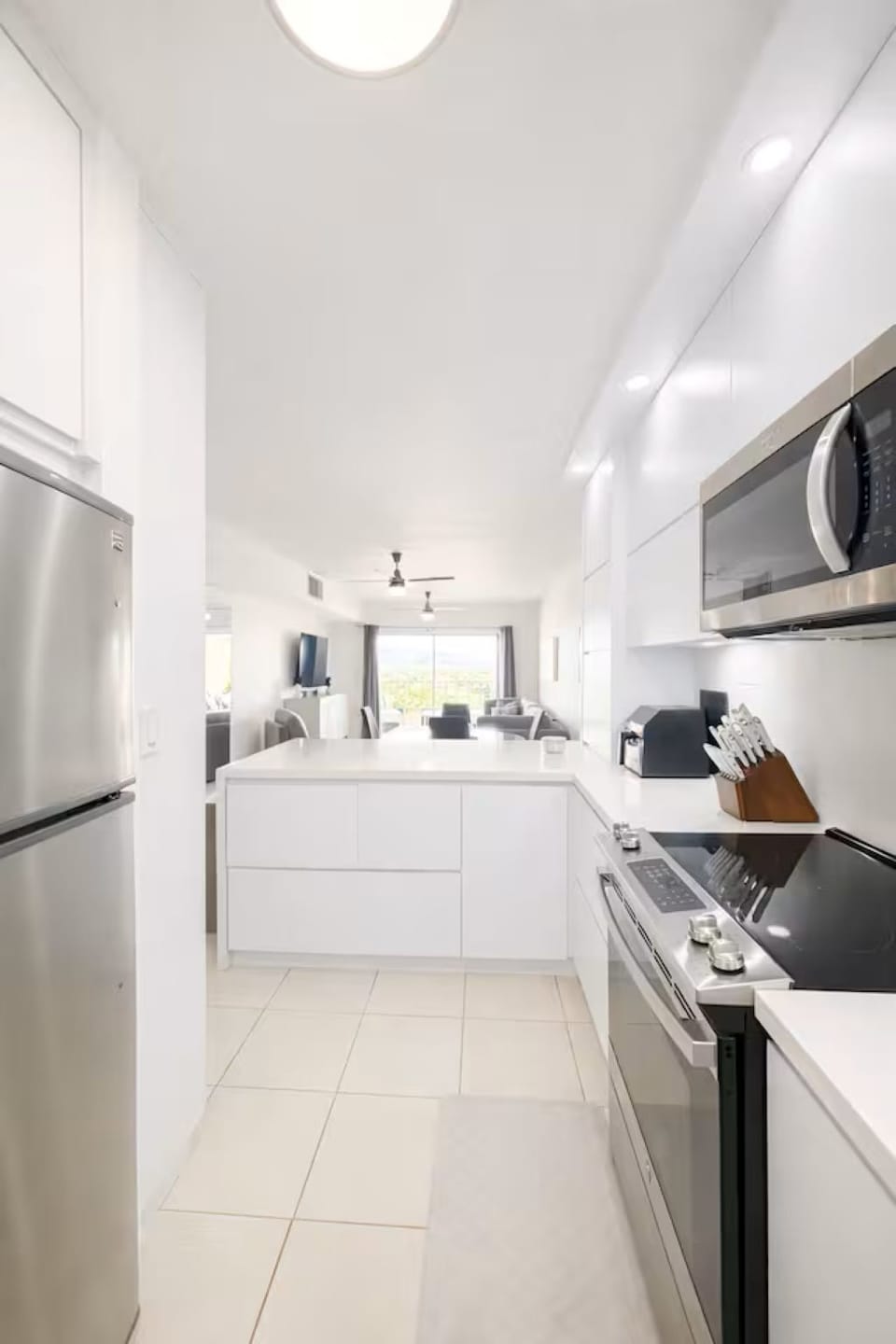 Clean modern kitchen with sleek finishes and everything at your fingertips.