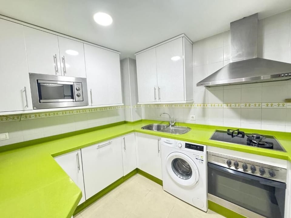Apartment, Balcony, City View | Private kitchen | Fridge, microwave, oven, stovetop
