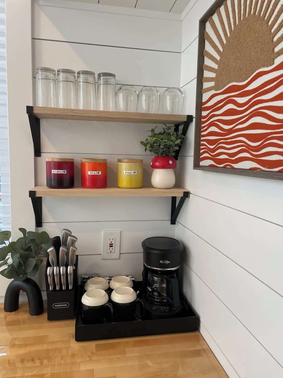 Coffee station and kitchen essentials with open shelving, cookware, knives, mugs, and countertop space for easy meals and slow mornings before exploring Zion National Park and Southern Utah.