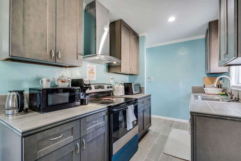 The kitchen offers plenty of storage space as well as coffee pods and sugar for your coffee. There is a porcelain tea kettle as well if tea is your preference! 