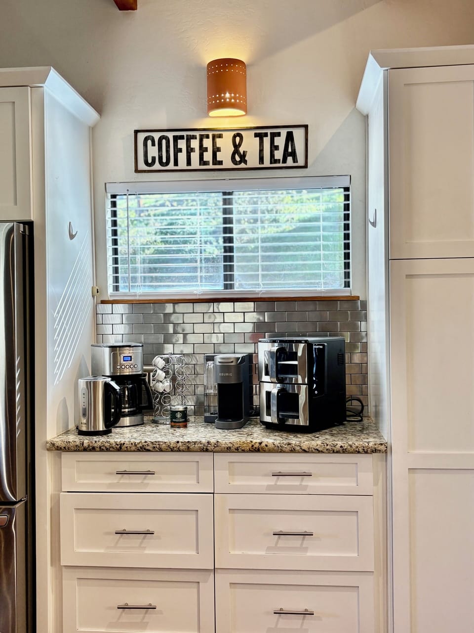 Fully stocked coffee & tea station featuring  Keurig, electric Kettle 