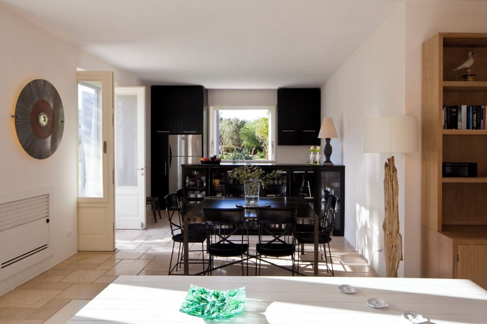 The kitchen and dining area at the other end.