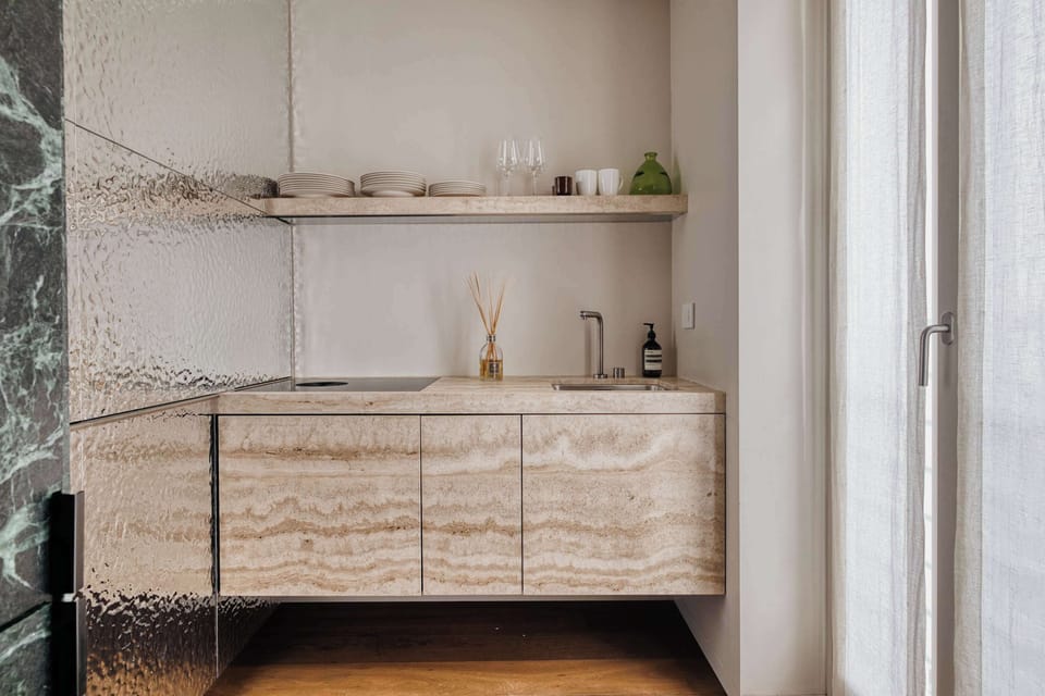 A light-filled, welcoming kitchen and modern details—perfect for slow mornings and casual home meals.