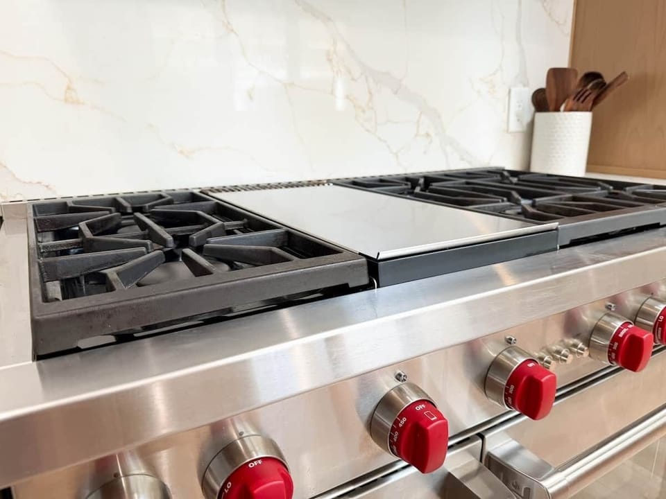 Six burners, a griddle, plus two ovens. 