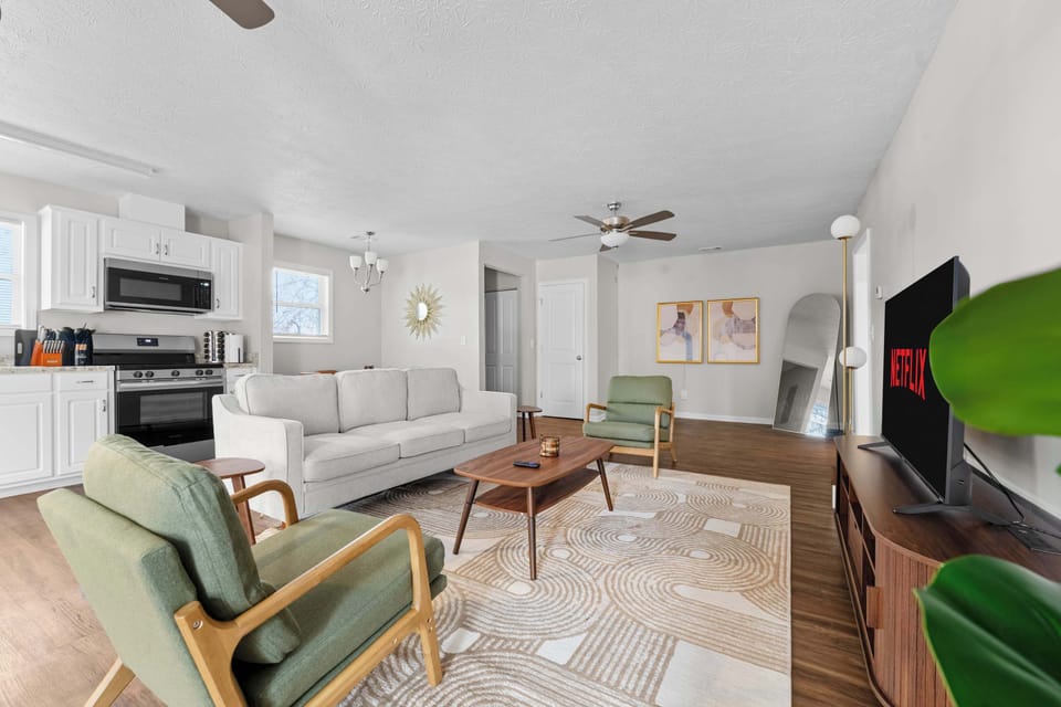 Kick back and relax in our beautifully designed living room. With plenty of natural light, comfortable seating, and all the modern amenities, it's the ideal space to gather and recharge.