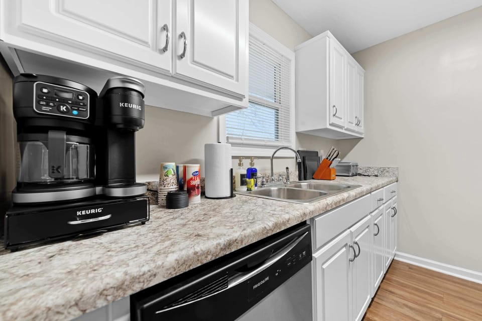Our bright, modern kitchen comes fully equipped with a dual coffee maker to jumpstart your day before you head out to explore.